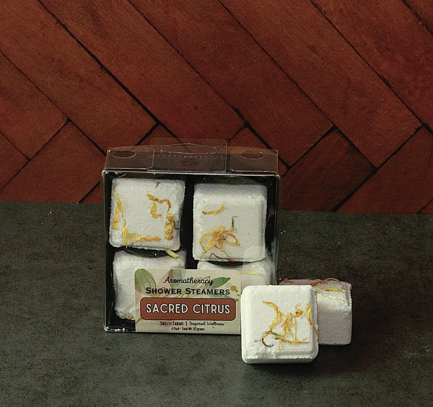 sacred citrus aromatherapy shower steamer lg.